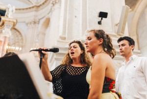 singer and guest during ceremony